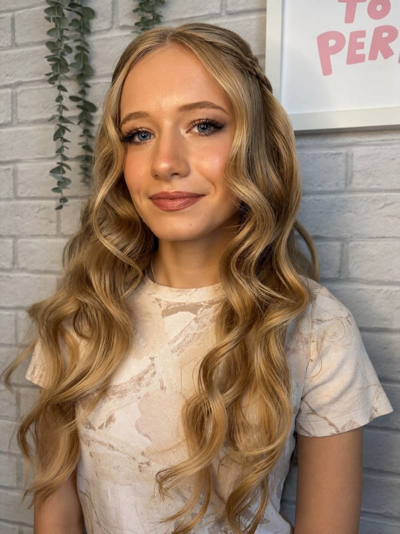 Long blonde hair in soft waves with natural makeup, styled by Lili in Whiteley